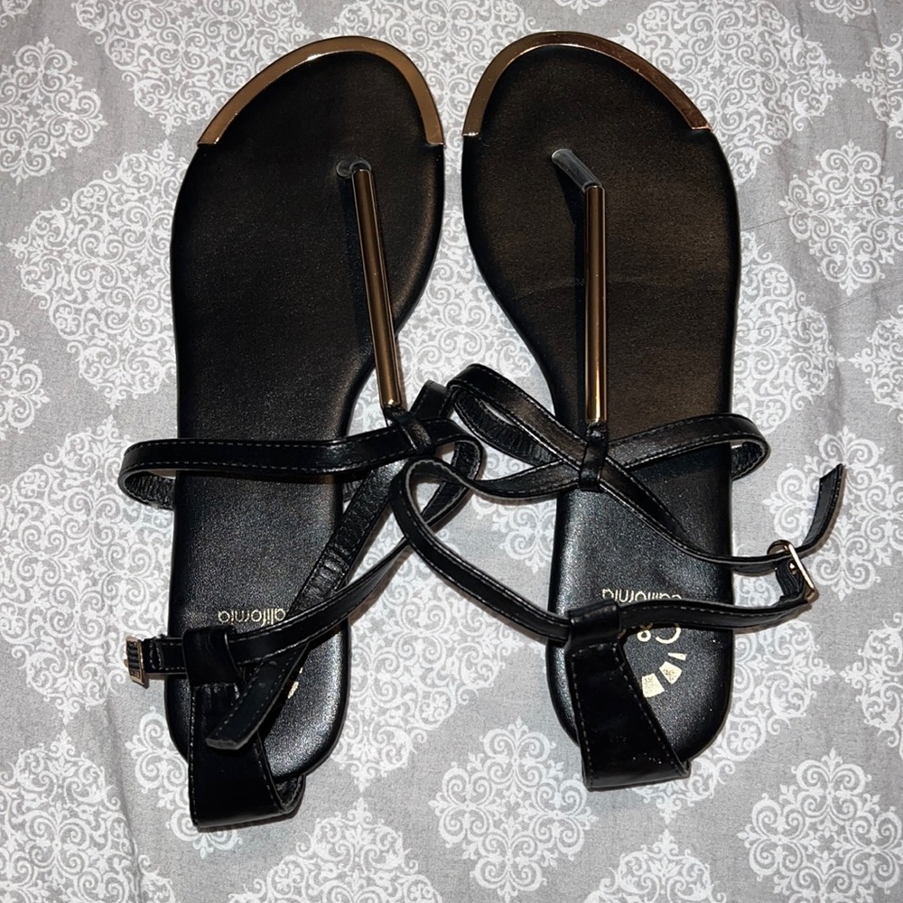 Black and gold sandals